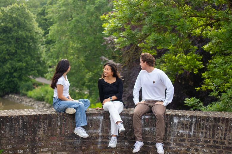 CES students at the old city wall in the city park